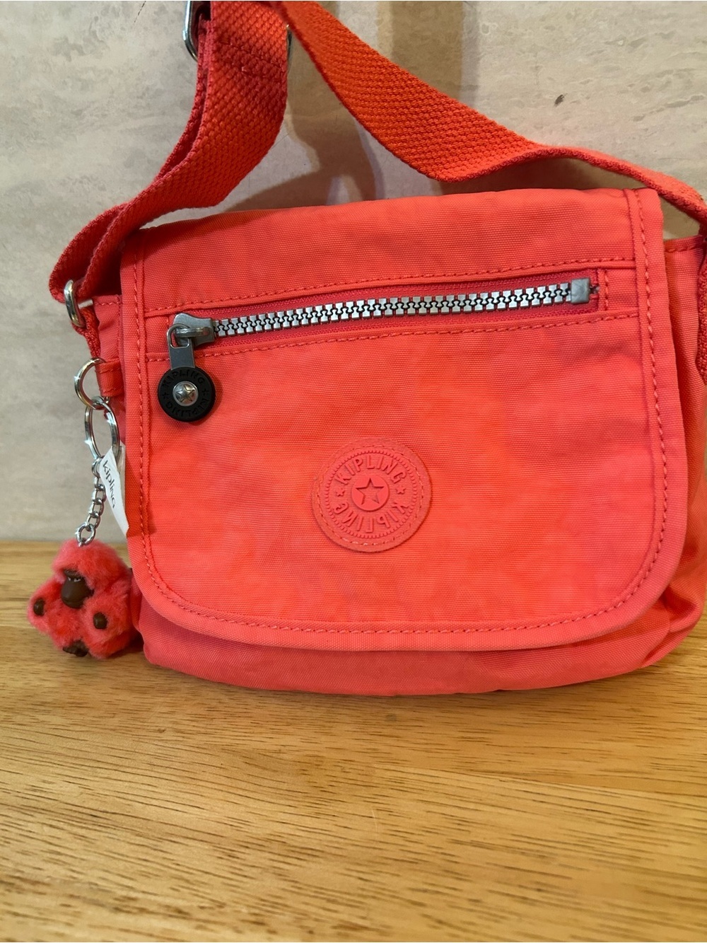 Kipling Sabian Coral-Pink  Crossbody Bag with Pom Pom Charm